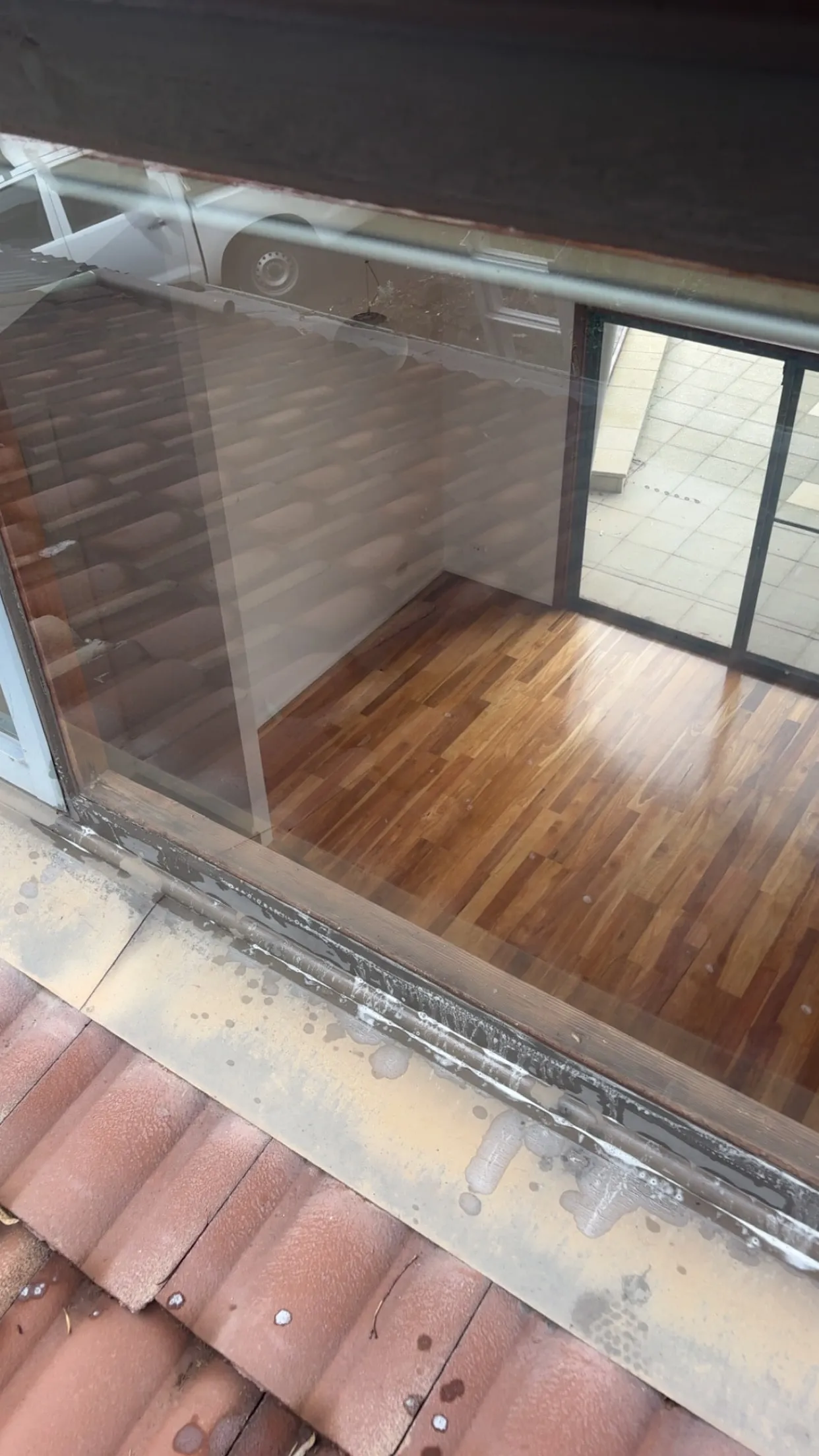Clean glass pool fencing and balustrade over a timber deck